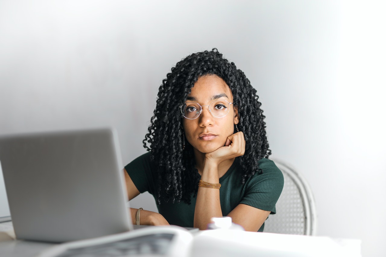 A stock photo by Andrea Piacquadio on Pexels, showing a person working on a laptop.