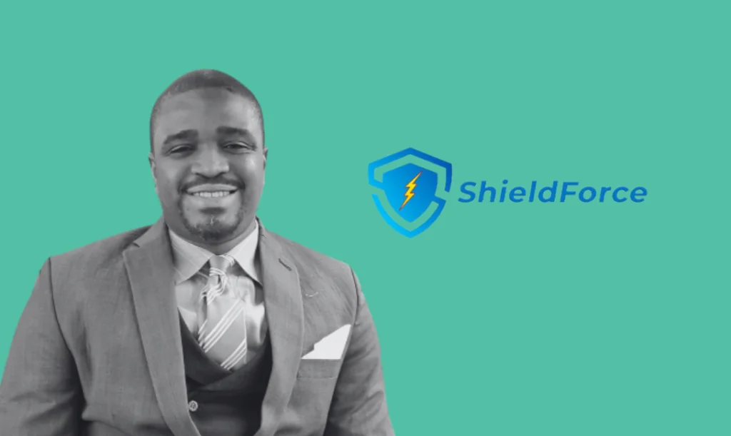 Obi Ibeto, Founder of Shieldforce, on a blue background